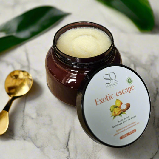 Gentle body scrub features nourishing Mango, Shea, and Cocoa Butters, alongside hydrating Avocado and Jojoba Oils.