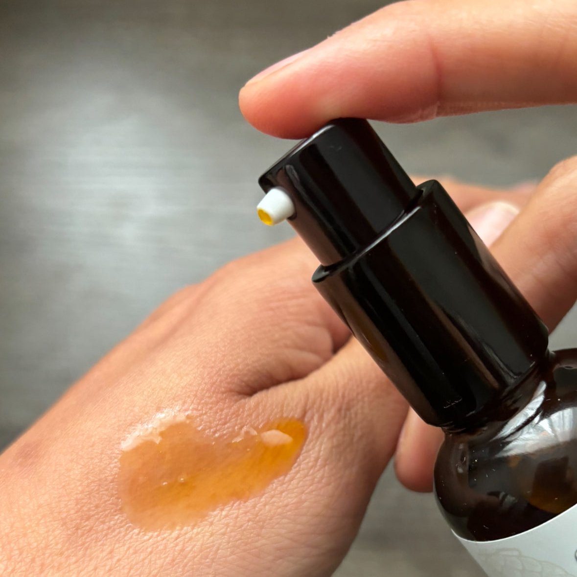 Age and sunspot reversal oil, rich in antioxidants and vitamin C for youthful and spot-free skin.